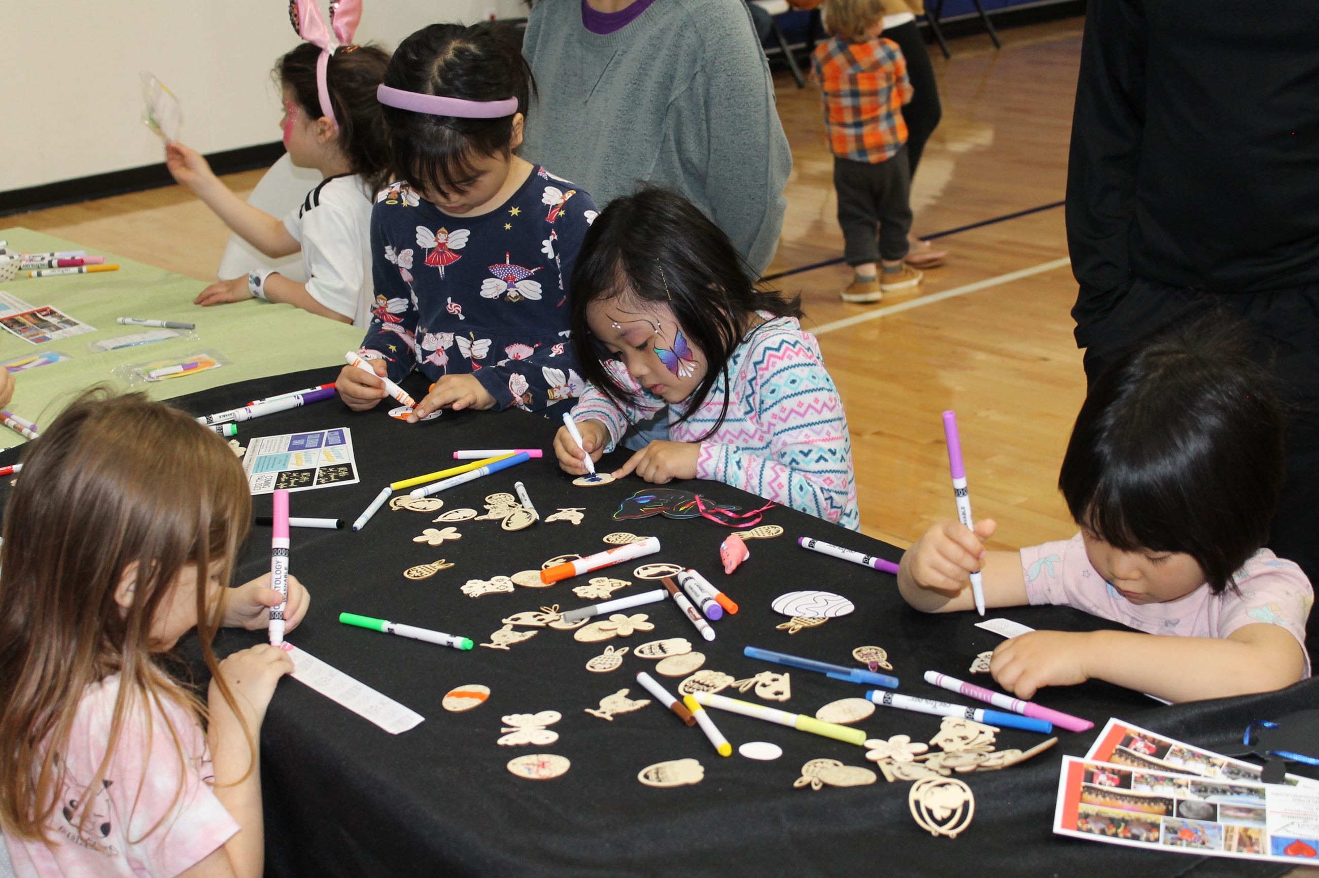 Kids doing crafts at the spring spectacular