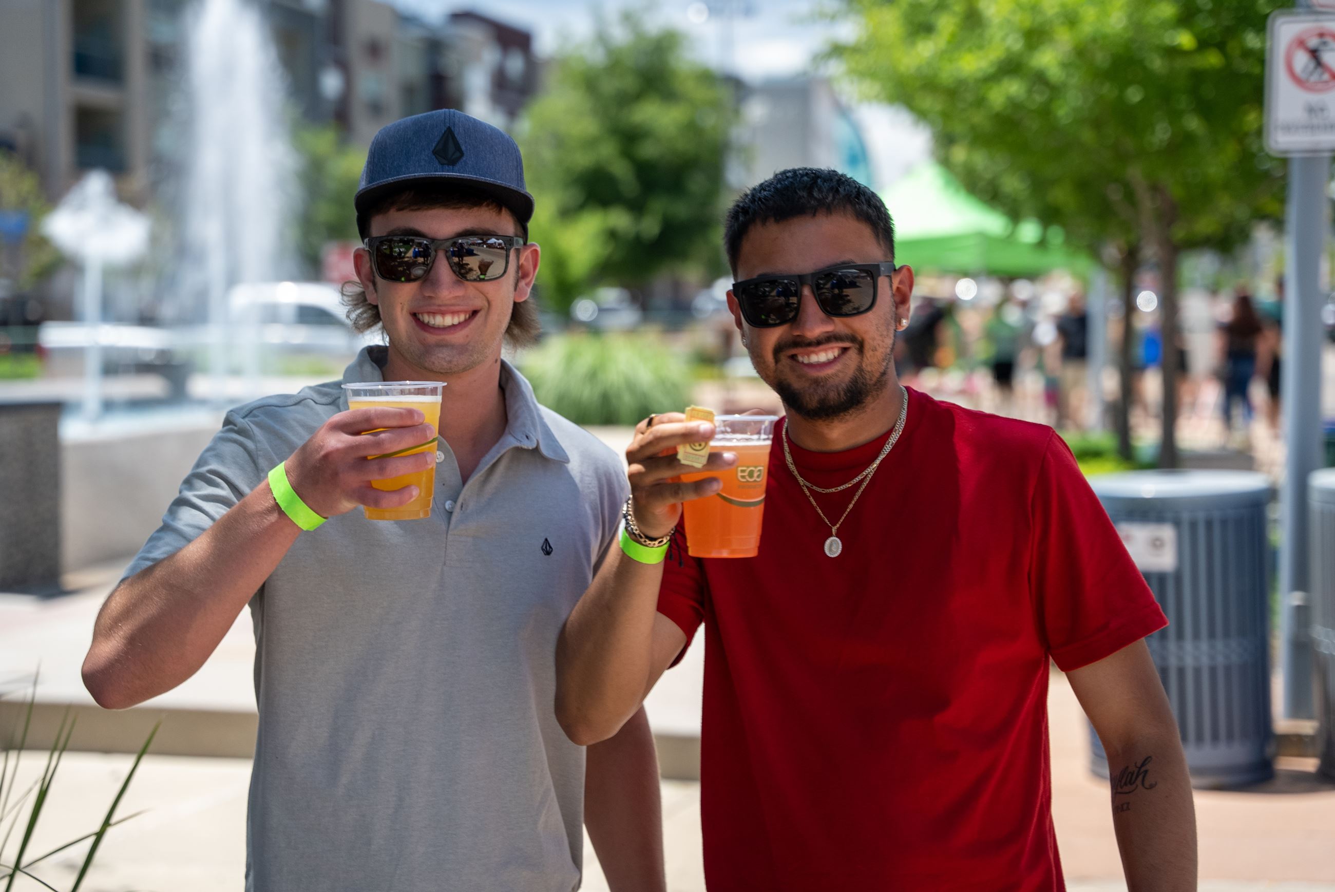 Two Attendees Enjoying Beer
